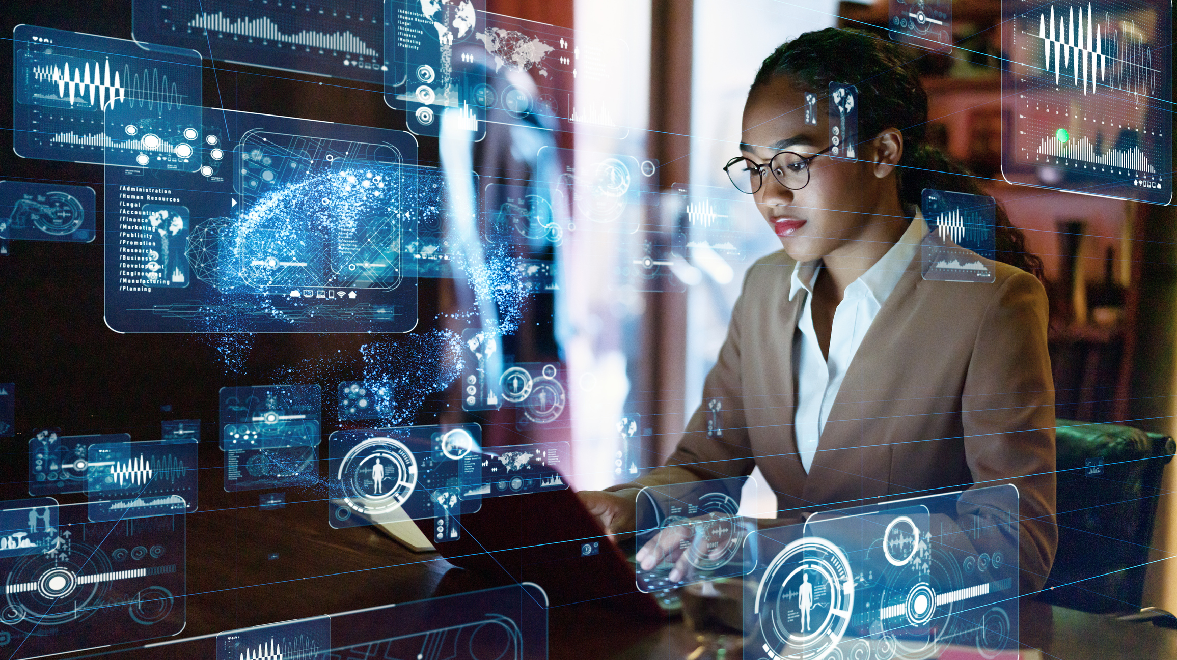 Woman working on a computer with smart data icons surrounding her. 